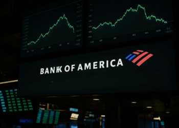 Pantalla financiera muestra logo de Bank of America y mensaje “Trade Deal Euphoria to Cool” con gráficos bursátiles cayendo